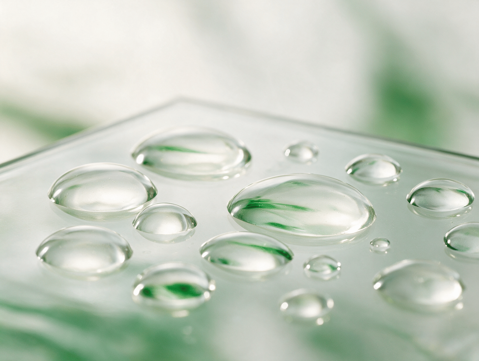 Smooth translucent gel drops on glass